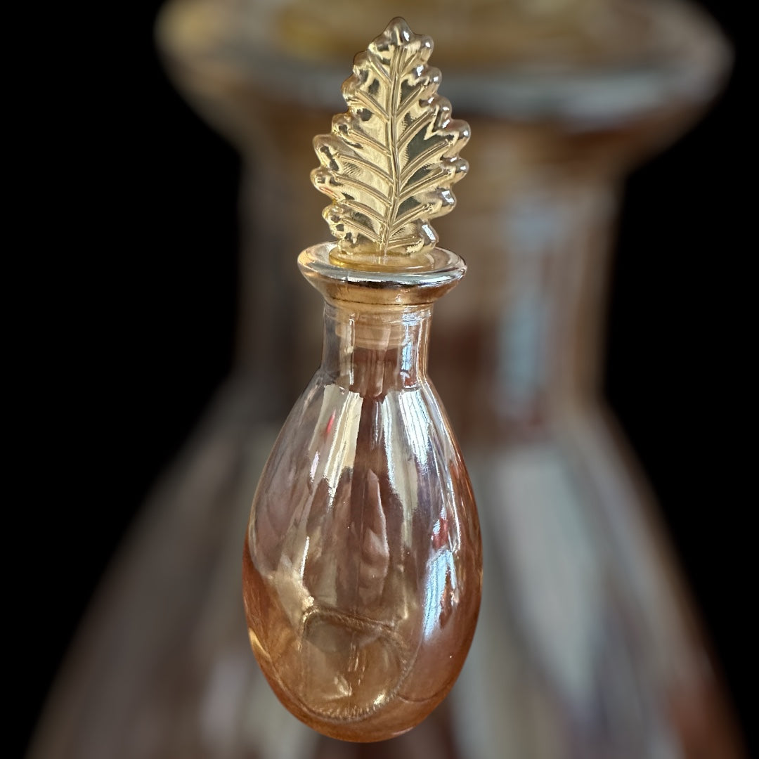 Vintage Glass Potion Bottle Leaf Top Iridescent