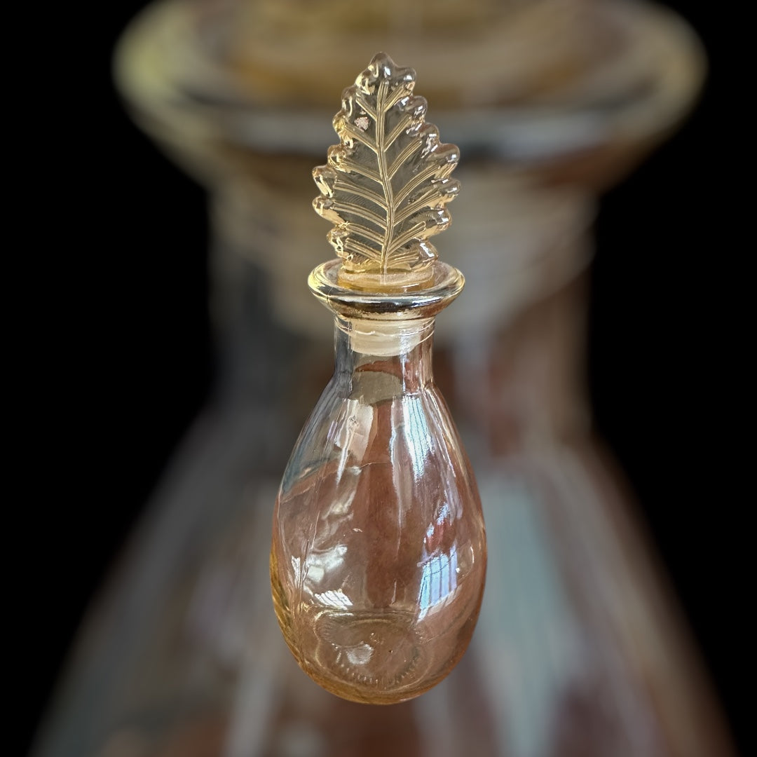 Vintage Glass Potion Bottle Leaf Top Iridescent