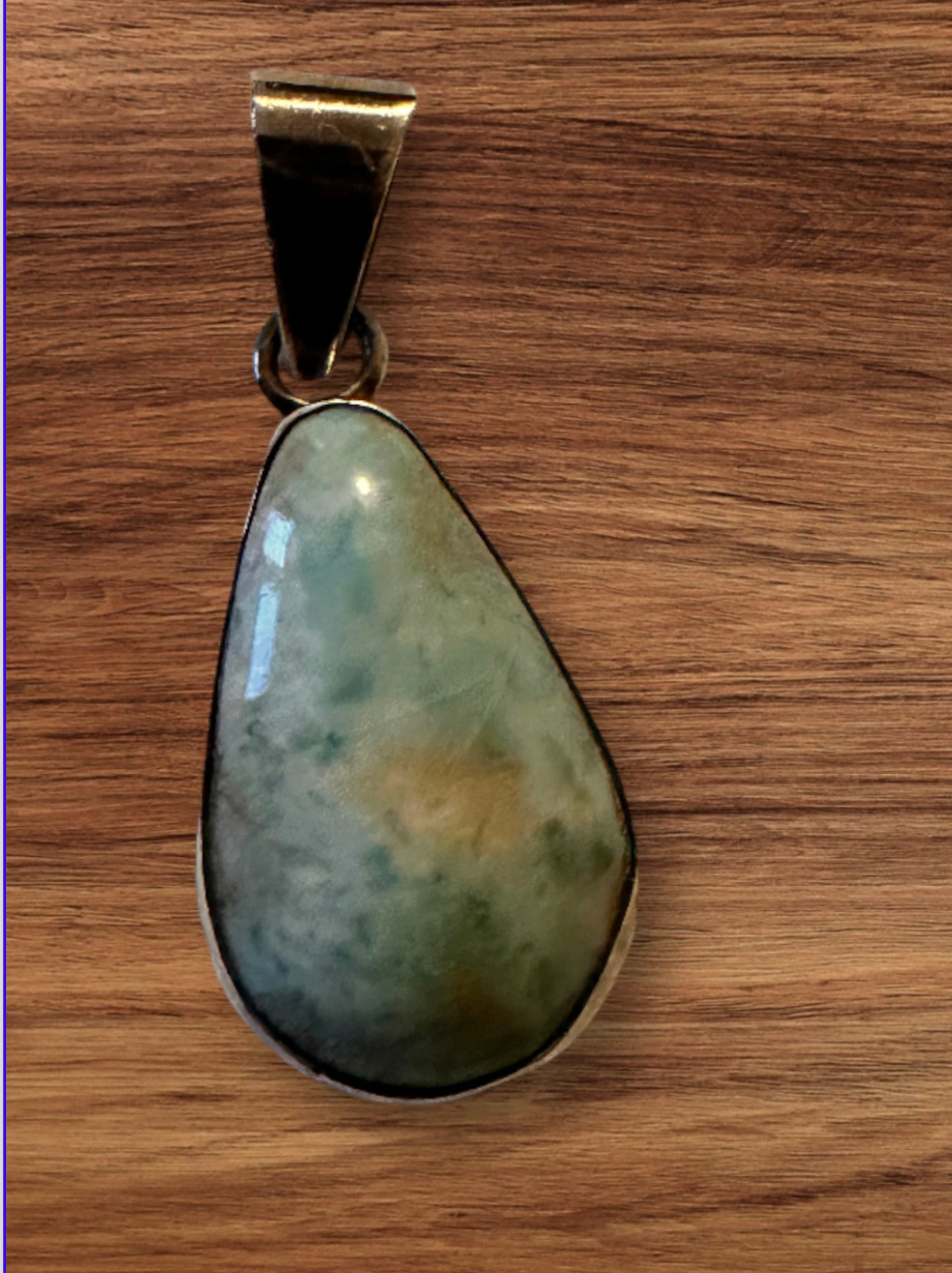 Vintage Larimar tear drop pendant set in sterling silver